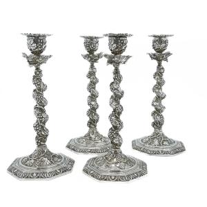 Set Of Four Cast Silver Candlesticks Decorated With Vines – France, Early 20th Century  