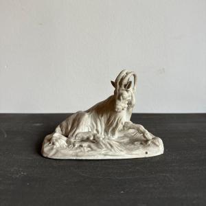 Sculpture Of A Goat Lying In Biscuit