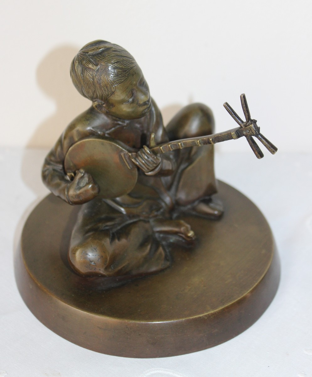 "SUONATORE DI SANXIAN" IN BRONZO, VIETNAM 1930 CIRCA.