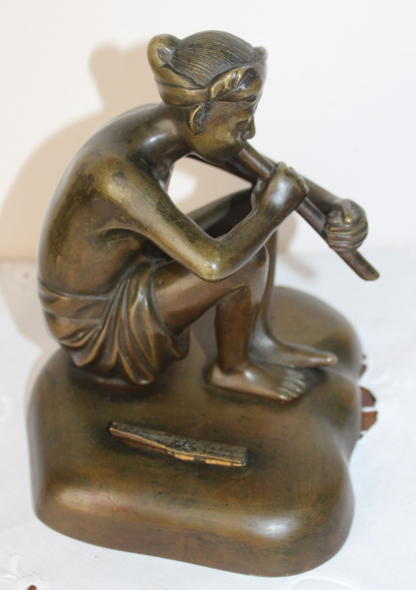 SUONATORE DI FLAUTO IN BRONZO, VIETNAM CIRCA 1930.