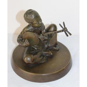"SUONATORE DI SANXIAN" IN BRONZO, VIETNAM 1930 CIRCA.