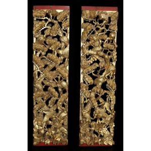 COPPIA DI PANNELLI CINESI IN LEGNO INTAGLIATO E DORATO, CINA 1920-1930.