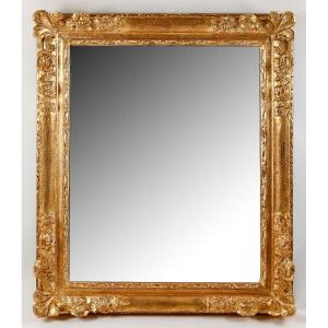 A French Regence Period Carved And Gilt Wood And Stucco Mirror Circa 1720