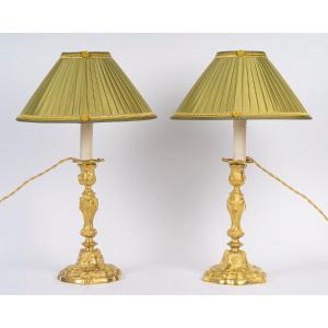 A Pair Of Rocaille-style Gilt Bronze Flambeaux, Mounted As Lamps, Palais Ducal De Nevers