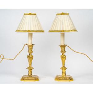 Pair Of French Regence-style Chiseled Gilt Bronze Candlesticks In The Manner Of Jean Berain