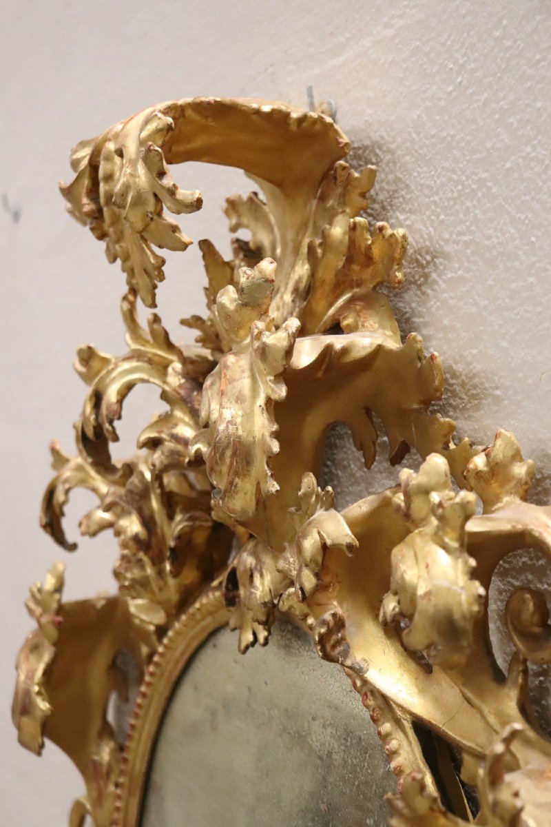 Specchio antico ovale in legno intagliato e dorato, XVIII secolo-photo-3