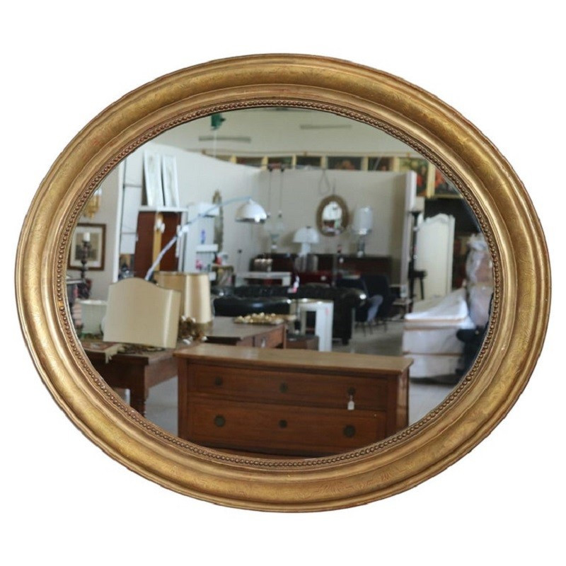 Antico specchio ovale in foglia oro