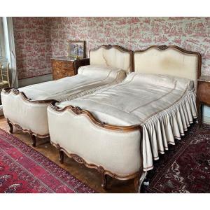 Pair Of Molded And Carved Walnut Beds. Louis XV Style.