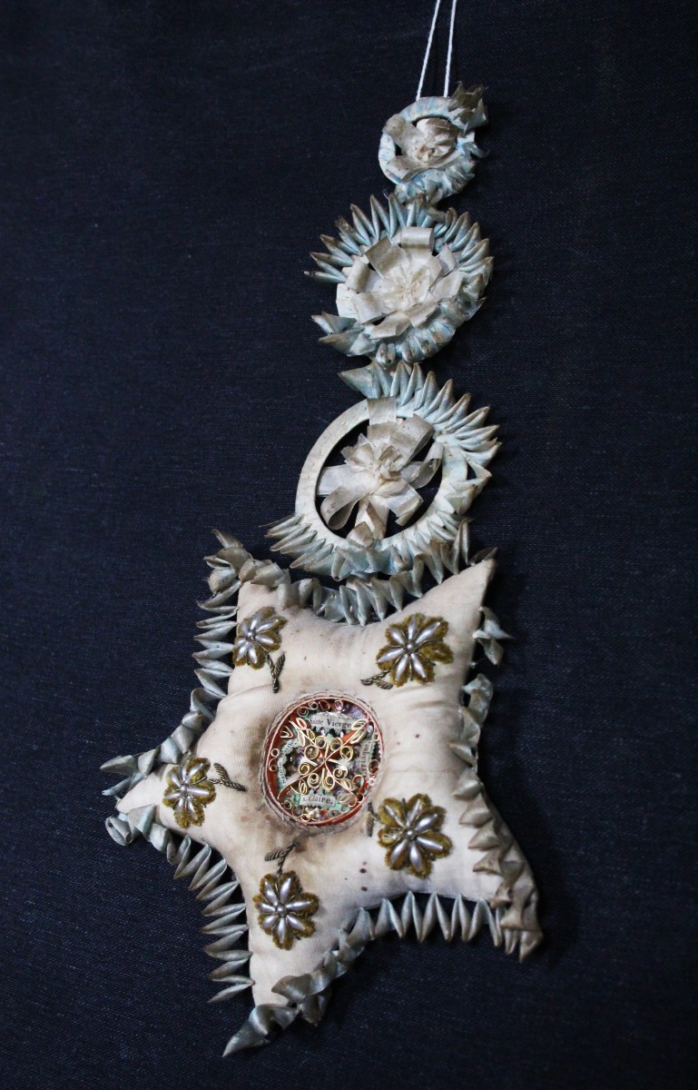 Reliquiario multiplo paperolles XIX secolo.