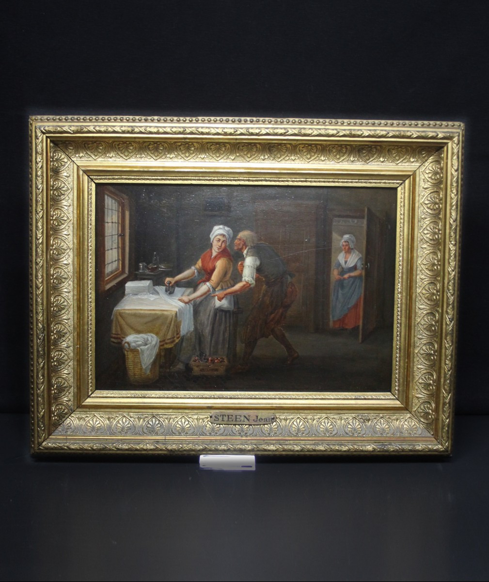 Scuola fiamminga, Interno con donna che stira