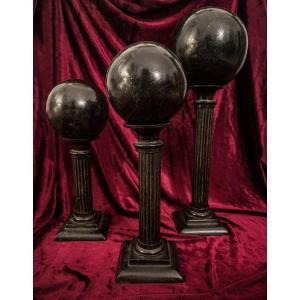 Neoclassical Set Of Three Bronze Columns And Spheres