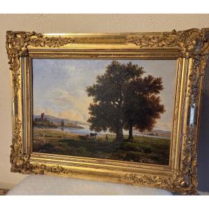 19th Century Italian Oil On Canvas Depicting A Cowherd And His Cows At The Water's Edge 