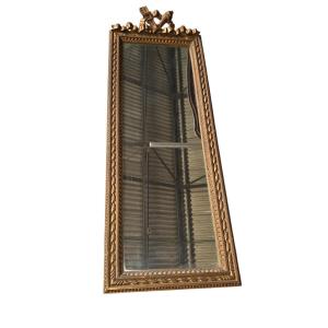 Late 19th Century Louis XVI Style Mirror Hanging Above A Small Hallway Console 