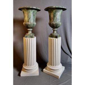 Pair Of Late 19th-century Cast Iron Medici Vases On A White Stucco Base 