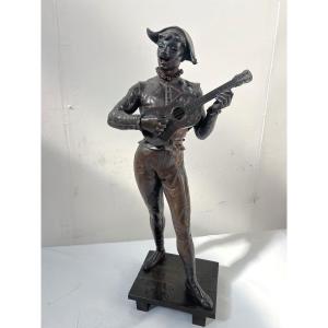 The Harlequin Musician Group In Bronze With Brown Patina By Debut Marcel