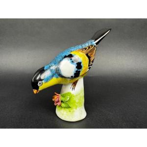 Porcelain Figurine Of A Polychrome Bird On A Vintage Floral Base