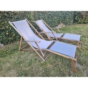 Vintage Pair Of Wooden And Canvas Deckchairs. 