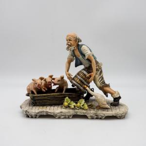 Statua Capodimonte “Allevatore di maiali” firmata Mollica
