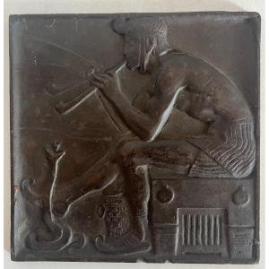 Incantatore di serpente placca bronzo bassorilievo