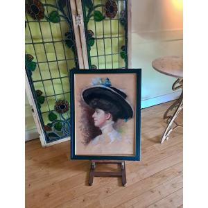 Portrait Of A Beautiful Young Woman In A Hat From The 1900s
