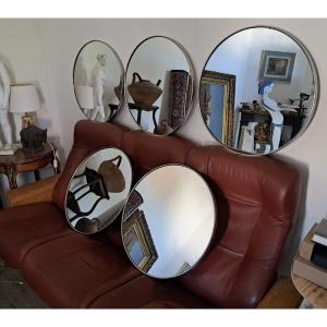 Set Of Five (large) Circular Stainless Steel Frames Enclosing A Mirror