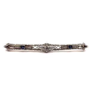 1184. Gold Brooch Decorated With Diamonds And Blue Sapphires 