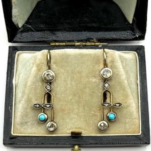 0773. Pair Of Gold Earrings Adorned With Diamonds And Turquoises
