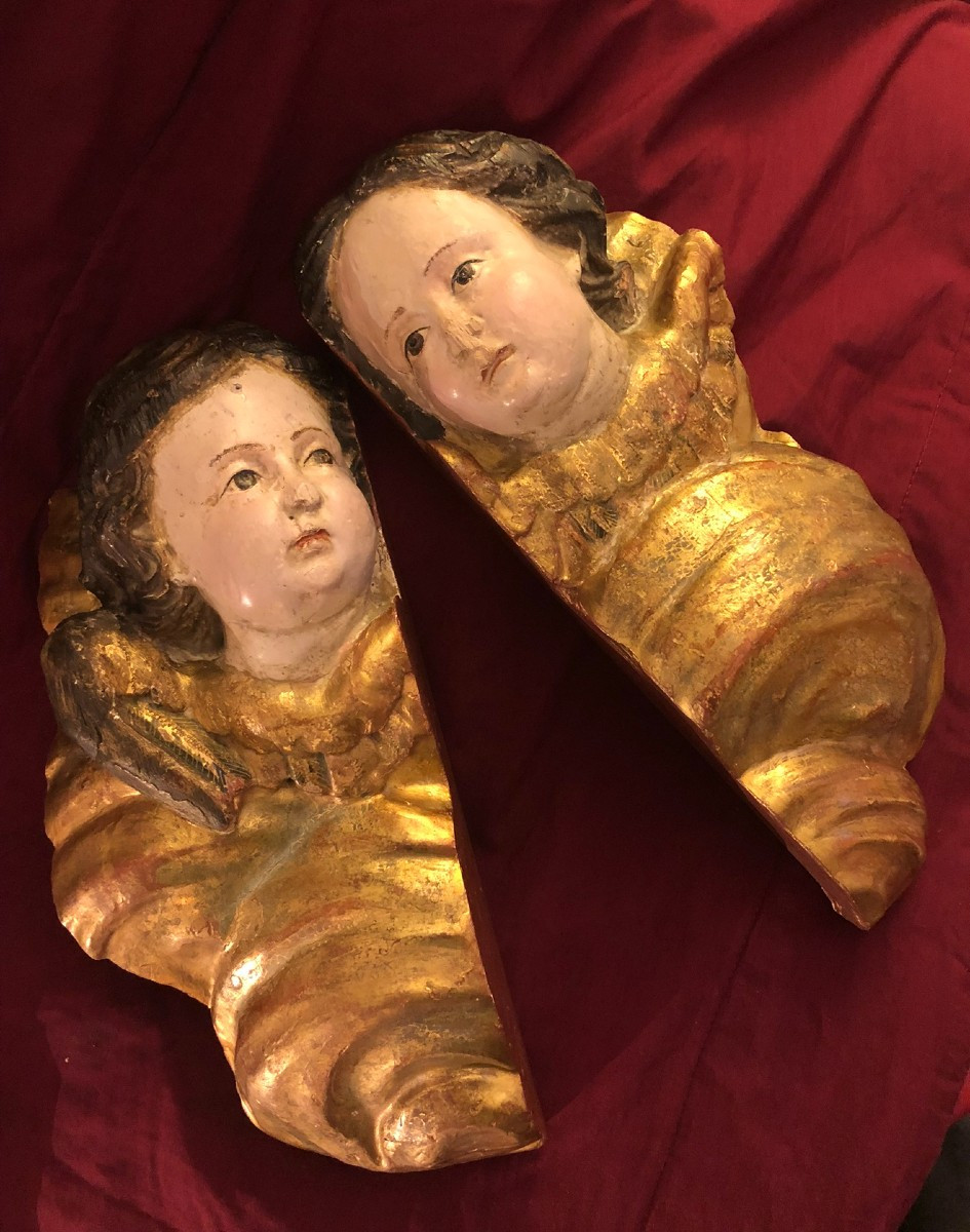 Coppia Putti lignei 