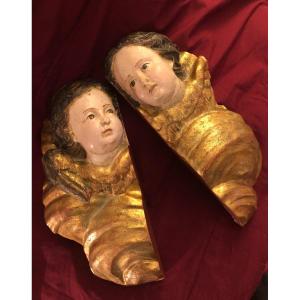 Coppia Putti lignei 