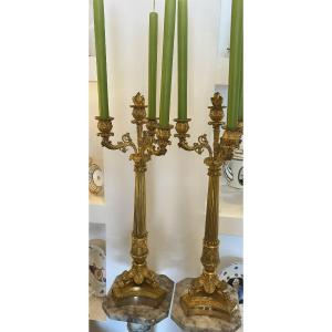 Grande coppia di candelabri  secolo XVIII in bronzo dorato al mercurio