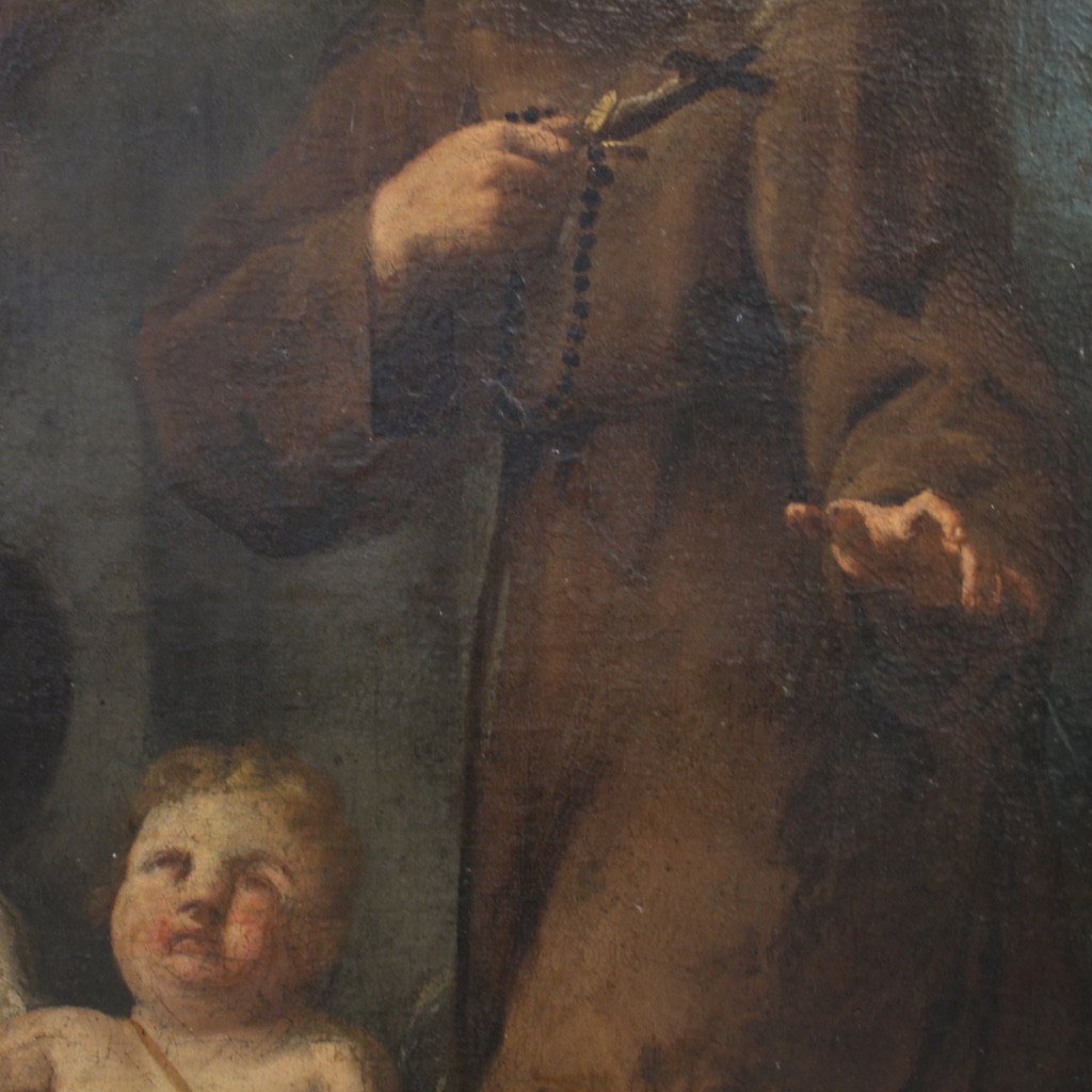 Antico dipinto Santo Francescano in preghiera con putti del XVII secolo-photo-1