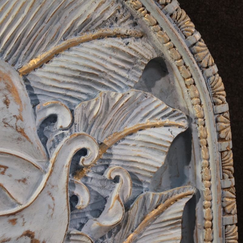 Scultura bassorilievo, volto stilizzato con fiori, XX secolo-photo-1
