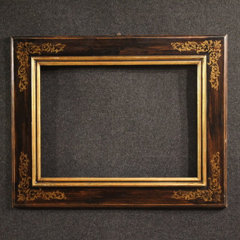 Cornice toscana in  legno dipinto e dorato del XX secolo 