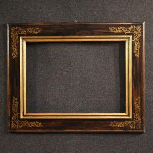 Cornice toscana in  legno dipinto e dorato del XX secolo 