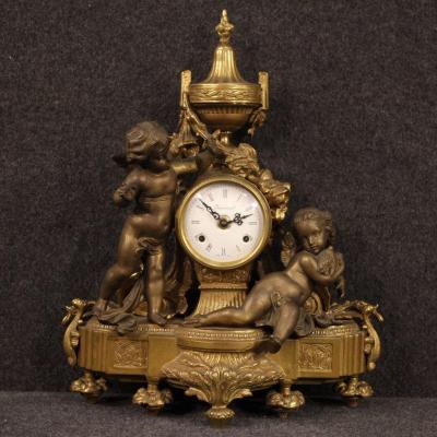 Orologio francese in bronzo e antimonio dorato