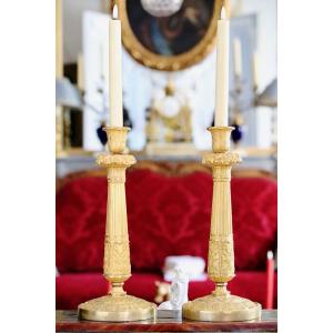 Pair Of Candlesticks In Gilt And Chiseled Bronze