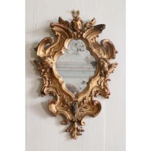 Italian Louis XV Mirror In Carved And Gilded Wood