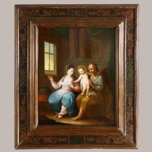 Northern Italian School Circa 1650/70. The Holy Family In An Interior.