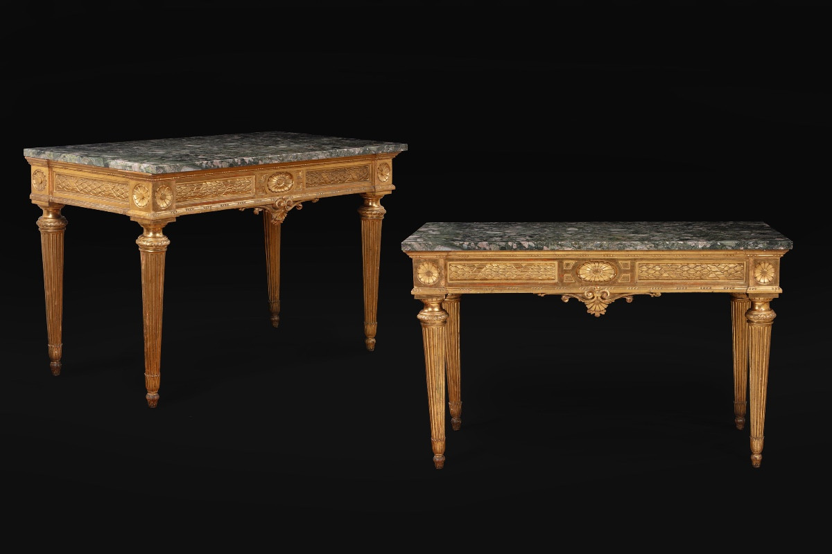 Coppia di consolles in legno dorato e scolpito con piano in granito, Epoca Luigi XVI
