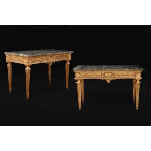Coppia di consolles in legno dorato e scolpito con piano in granito, Epoca Luigi XVI