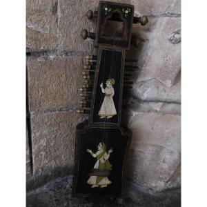 Indian Saranghi With Character Decoration. Musical Instrument