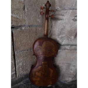 Violin Carved With The Image Of Django Reinhard. Musical Instrument