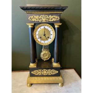 Empire-style Clock In Bronze With Double Patina