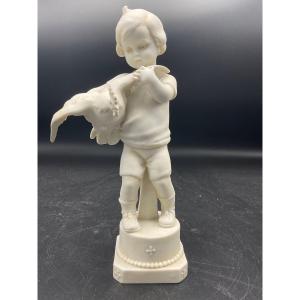 Biscuit From The Müller Factory Located In The Thuringia Region In Germany Representing A Boy With A Hen In His Arms.