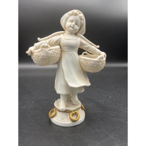 Biscuit From The Müller Manufacture Representing A Young Girl Carrying Two Baskets 