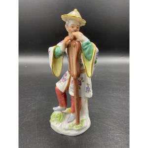 Meissen Polychrome Porcelain Depicting A Japanese Man In Traditional Costume Standing.
