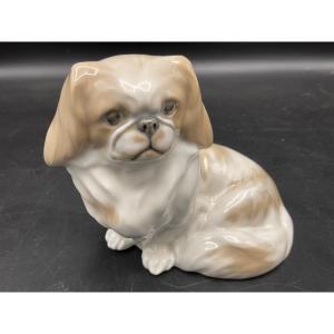 Pekingese Dog In Polychrome Porcelain From The Royal Copenhagen Factory Signed Peter Herold.