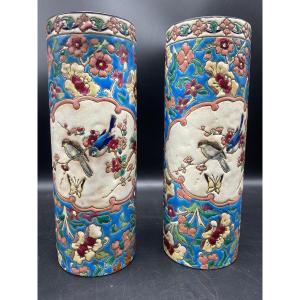 Pair Of Longwy Enamel Scroll Vases Decorated With A Cartel Depicting Two Perched Birds.