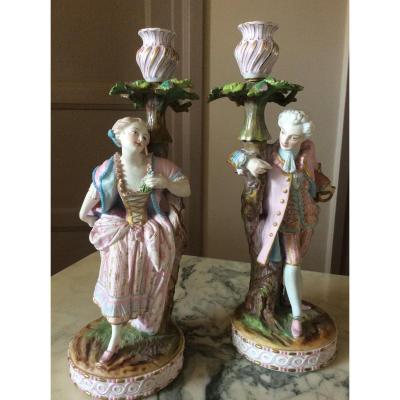 Chantilly: Pair Of Candlesticks In Polychrome Painted Biscuit Representing A Couple.