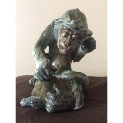 Polychrome Porcelain Monkey Playing With A Turtle By E.ilinsky And Edmond Etling Editor.